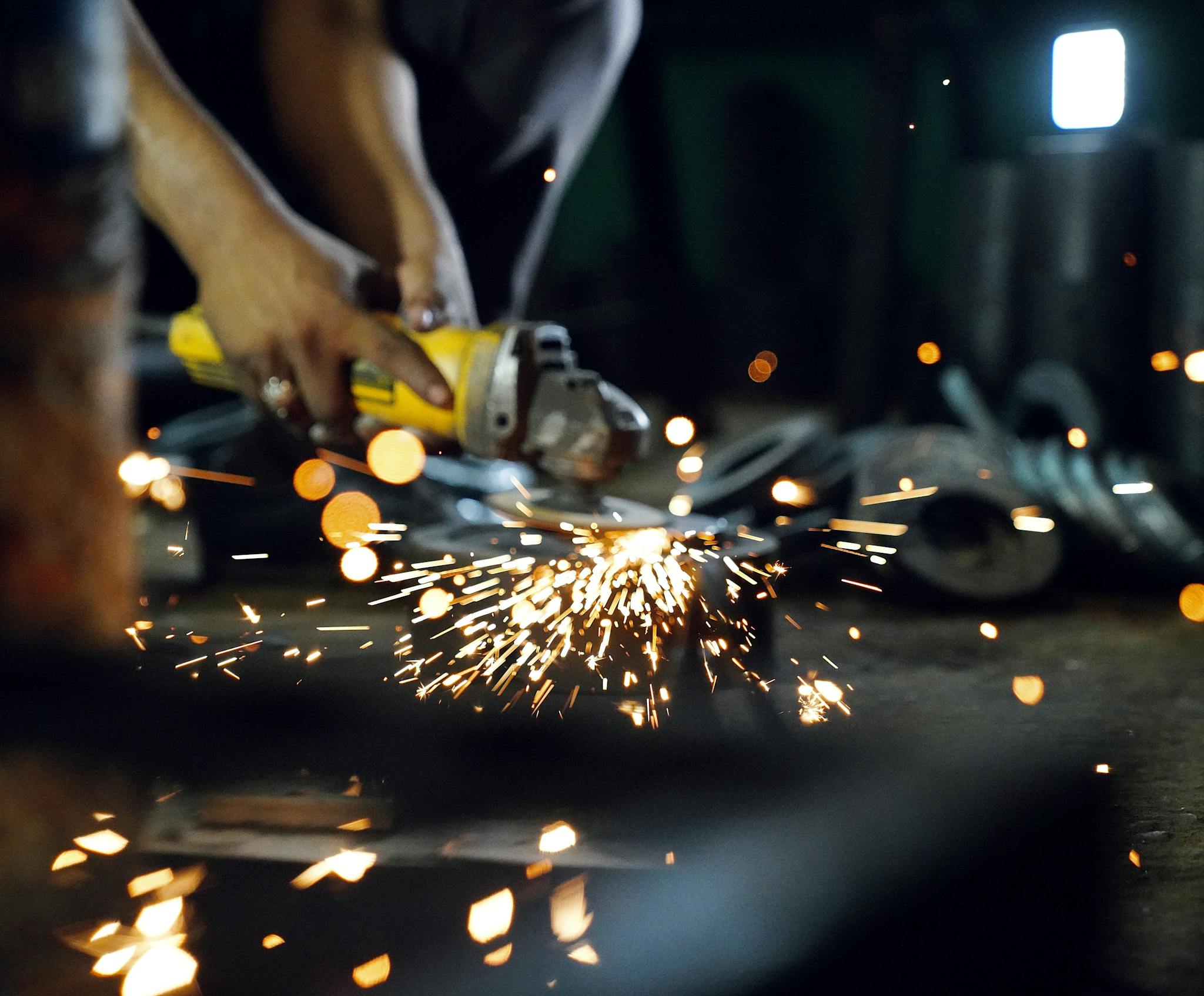 A Person Using a Grinder