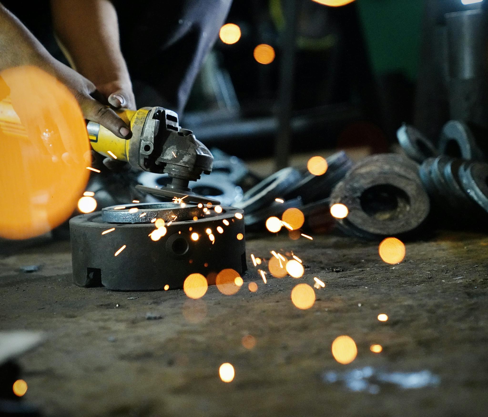 A Person Using a Grinder